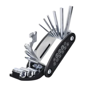 Bike multitool opened on clean light background