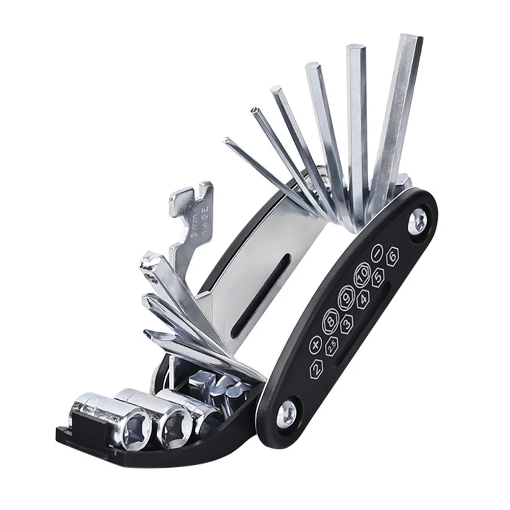 Bike multitool opened on clean light background