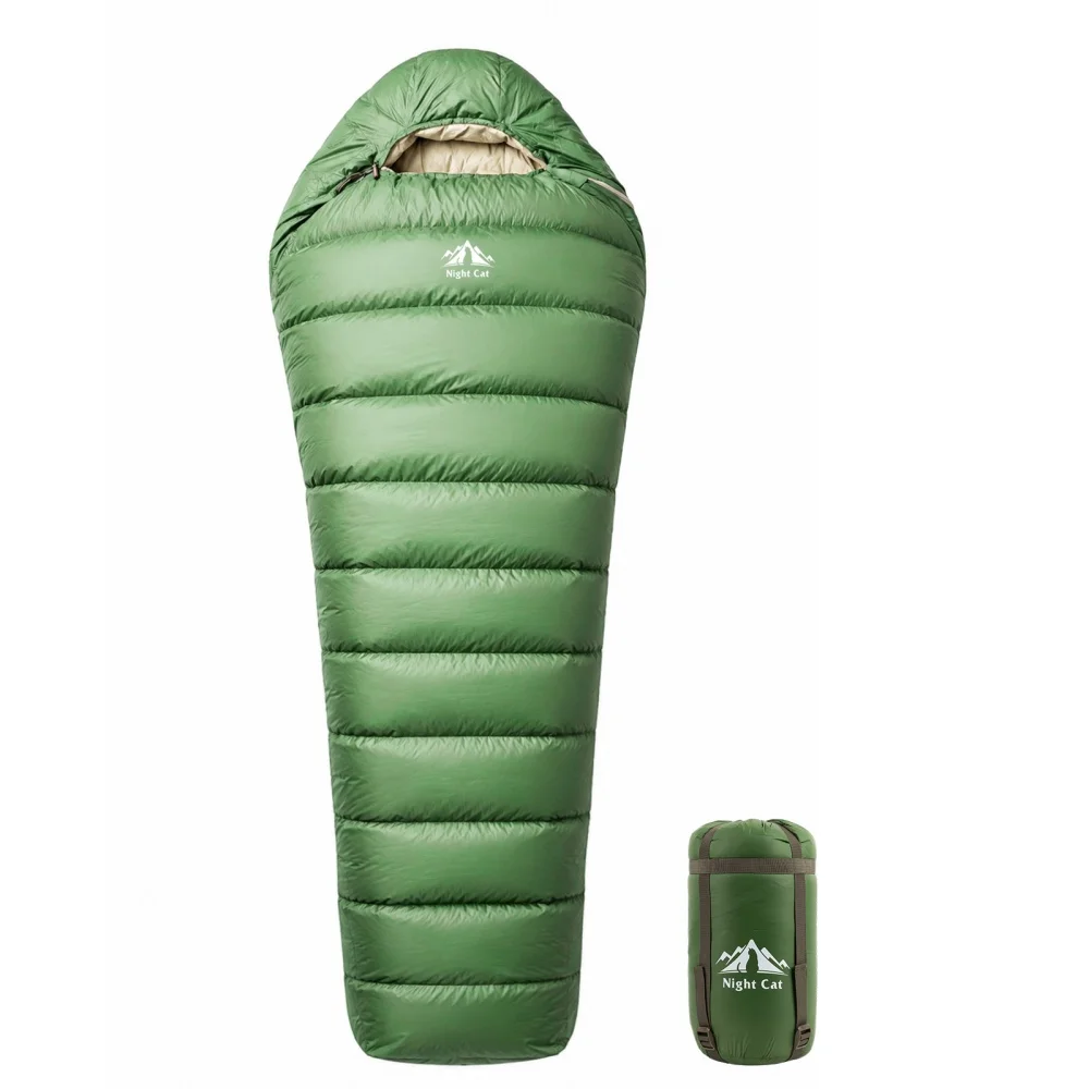 Night Cat down sleeping bag, green hooded mummy with its compression stuff sack